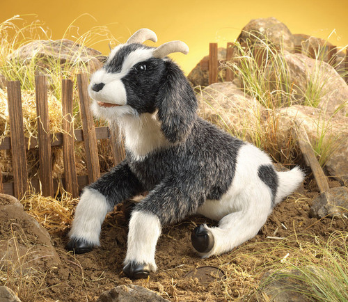 The Folkmanis Goat Puppet is a charming and lifelike farmyard friend, perfect for storytelling and imaginative play! 

Features:
- Salt-and-pepper plush fur for a realistic look.
- Floppy ears and soft sueded cloth horns add extra character.
- Weighted vinyl hooves for lifelike movement—great for jumping and climbing play.
- Movable mouth for expressive storytelling and interaction.

Dimensions: Length 48 cm x Height 30 cm x Width 13 cm

Ages 3+ years

Ideal for puppet shows, interactive storytelling, and pretend play.

This puppet even won the 2005 TOP CREATIVE CHILD TOY AWARDS Preferred Choice!