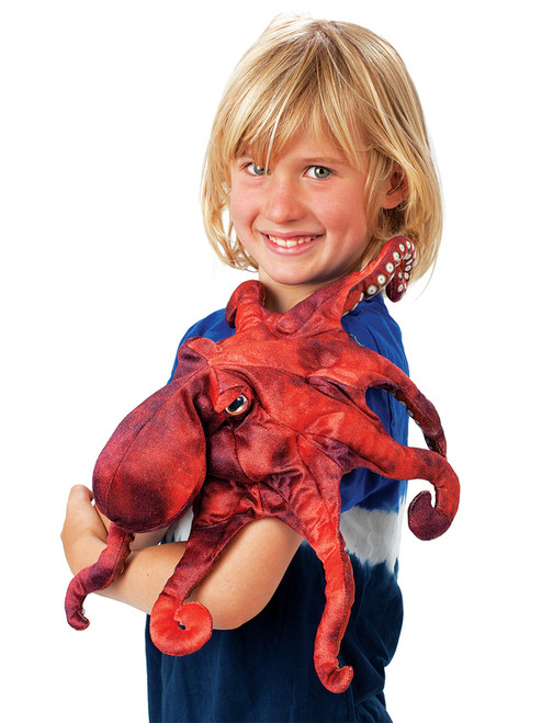 Dive into the depths of imagination with the Red Octopus Puppet!

This fascinating sea creature is brought to life with vivid coloration and eight flexible arms, five of which are operable for dynamic movement.

Features:
Realistic Design: Printed suction cups on the underside of each arm add lifelike detail.
Interactive Play: Easy to wriggle around—fits like a glove for seamless puppetry.
Award-Winning Quality: Recognized with multiple accolades, including the Parents' Choice Silver Award and Dr. Toy’s Best Creative Products.
Perfect for All Ages: A fantastic addition to puppet shows, storytelling, and ocean-themed adventures!

Size: 48 cm (L) x 10 cm (H) x 48 cm (W)
 Age: 3+ years

Bring the wonders of the ocean to life with the Folkmanis Red Octopus Puppet—a mesmerizing companion for creative play!