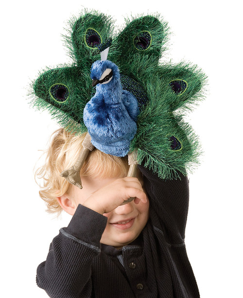 Bring vibrant storytelling to life with the Folkmanis Small Peacock Puppet.

This dazzling hand puppet features the brilliant plumage of the male peacock, designed with exquisite detail and rich colors that captivate children and adults alike.

Easy to animate with a movable head and tail, it encourages imaginative play, role‑playing, and interactive learning.

Perfect for classrooms, libraries, or family playtime, this puppet sparks creativity while introducing kids to the beauty of wildlife.

Compact yet eye‑catching, the Small Peacock Puppet makes a delightful gift for ages 3+ and a charming addition to any puppet collection.