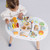Spark your child’s imagination and developmental skills with the Petilou Activity Table by Le Toy Van.
This beautifully designed wooden activity table is packed with engaging features that will keep your little one entertained for hours.
The table includes 11 different activities, such as a bead maze, shape sorter, rainbow xylophone, scratchboard, turning gears, and a spinning rattle, all designed to stimulate your child’s senses and motor skills.
 The alphabet is displayed around the edge of the table, helping to introduce letters in a playful and interactive way.
Crafted from sustainable rubberwood and decorated with non-toxic, water-based paints, ensuring a safe play environment for your child.
Recognized for its thoughtful design and educational value, making it a favorite among parents and educators.
Encourage your child’s curiosity and developmental growth with the Petilou Activity Table.
erfect for toddlers, this activity table is an excellent addition to any playroom, providing endless opportunities for learning and fun.
Ages 18 months + Spark your child’s imagination and developmental skills with the Petilou Activity Table by Le Toy Van.
This beautifully designed wooden activity table is packed with engaging features that will keep your little one entertained for hours.
The table includes 11 different activities, such as a bead maze, shape sorter, rainbow xylophone, scratchboard, turning gears, and a spinning rattle, all designed to stimulate your child’s senses and motor skills.
 The alphabet is displayed around the edge of the table, helping to introduce letters in a playful and interactive way.
Crafted from sustainable rubberwood and decorated with non-toxic, water-based paints, ensuring a safe play environment for your child.
Recognized for its thoughtful design and educational value, making it a favorite among parents and educators.
Encourage your child’s curiosity and developmental growth with the Petilou Activity Table.
erfect for toddlers, this activity table is an excellent addition to any playroom, providing endless opportunities for learning and fun.
Ages 18 months +