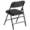 TYCOON Series Curved Triple Braced & Double Hinged Black Patterned Fabric Metal Folding Chair