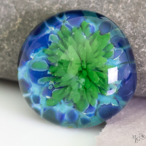 Bright green and water pattern blues. It's like looking into a tidepool along the shore. 24mm