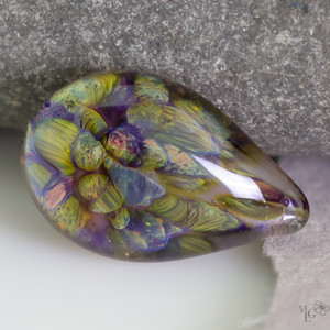 Green, Purple, Mango glass cabochon in a tear drop shape.  The brighter the light you view it the better the colors are. 20mm long by16mm wide