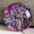This cabochon is so full of life. The background is a mix of mango and pink. The Bloom has rust, purple, orange and hints of green