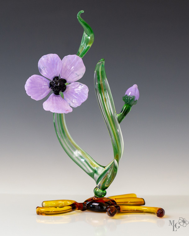 Bring some artistic cheer into your home environment with this long lasting glass bloom