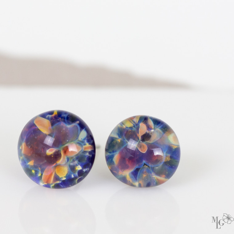 Small implosion glass earring studs with a flower garden feel. 9mm. Titanium Posts