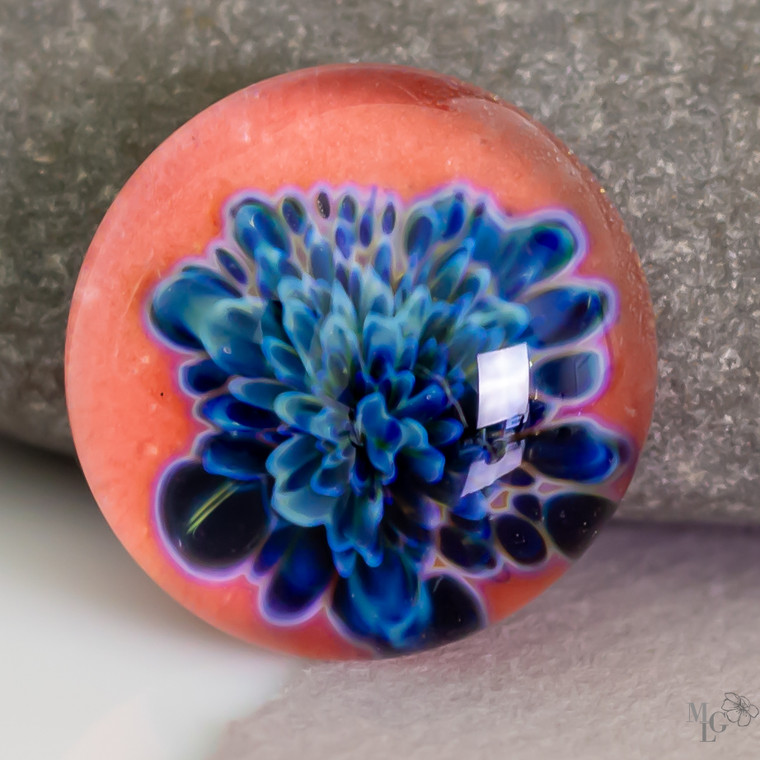 Vibrant electric blue petals blooming up from an orange/mango background. What a beautiful contrast. 25mm lampwork cabochon