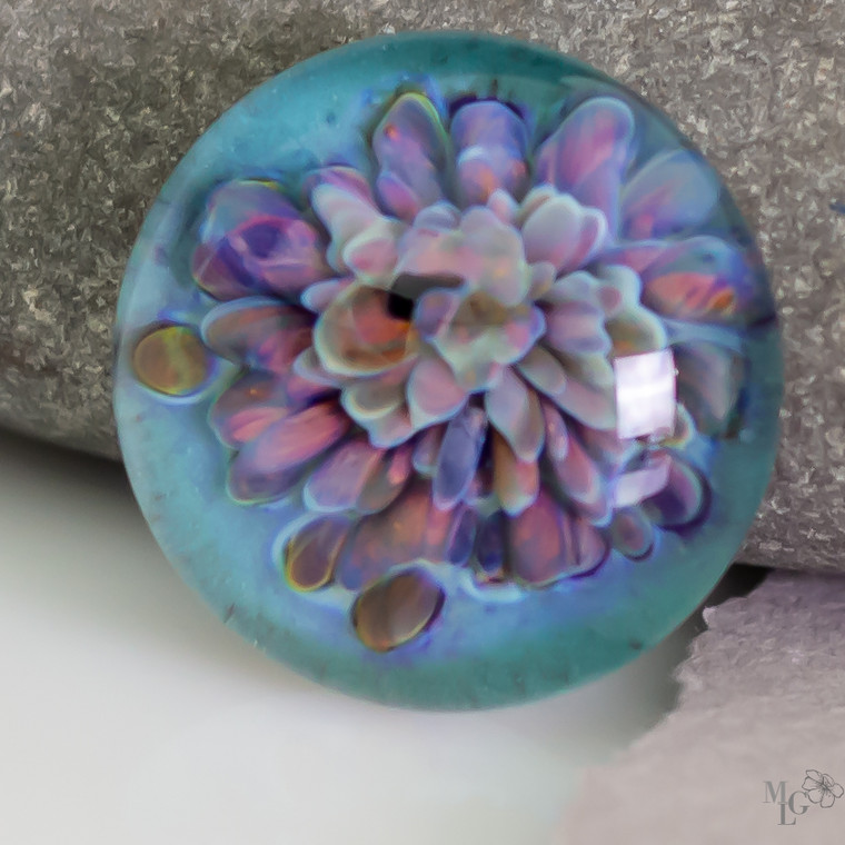 Soft Pastel aqua with an implosion of purple, green, blue and pinks. Gorgeous cabochon in tropical colors. 24mm