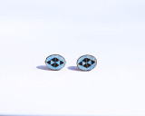 Turquoise earrings with etched pattern