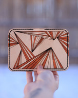 Outside leather card holder with ray pattern