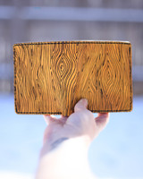 Leather wallet with engraved wood grain