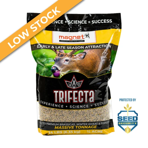 Bag of Magnet Outdoors TRIFECTA food plot seed featuring a high-performance blend of winter wheat, oats, and brassicas. Designed for rapid growth and maximum deer attraction in early fall and late winter, this cold- and drought-tolerant mix provides nutritious forage to keep whitetails active throughout hunting season.