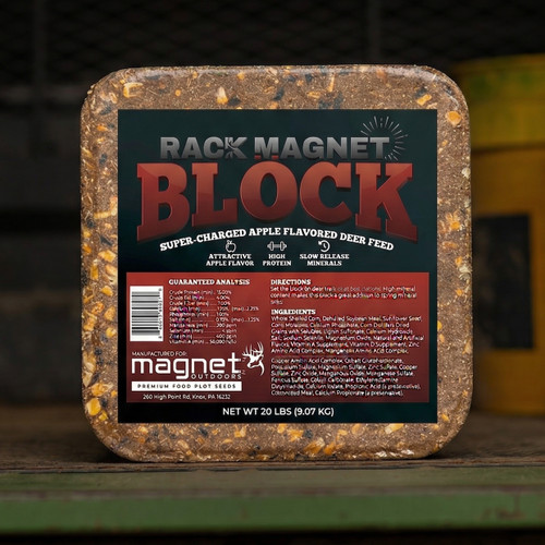 Close-up of Rack Magnet deer mineral block showing dense nutrient-rich attractant texture