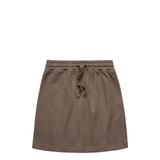 A terry skirt in olive green with an elastic waistband and drawstring. It includes a logo on the waistband.