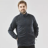 A man wearing a navy polar fleece jacket with a full zip, featuring a collar and side pockets.