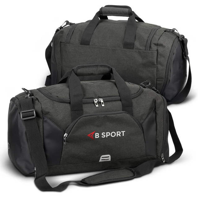 A dark green duffle bag with black accents and a shoulder strap, featuring a logo on the side.