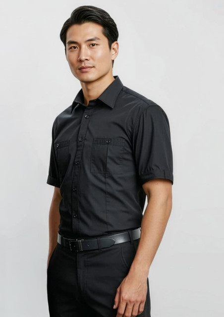 A black short sleeve button-up shirt featuring two chest pockets and a subtle logo.