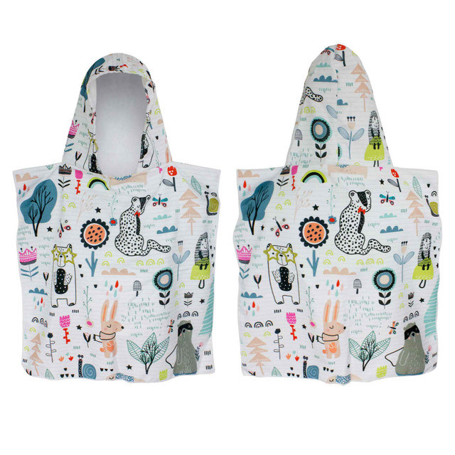 A kids hooded towel featuring playful animal and nature designs in pastel colours. It includes a logo.