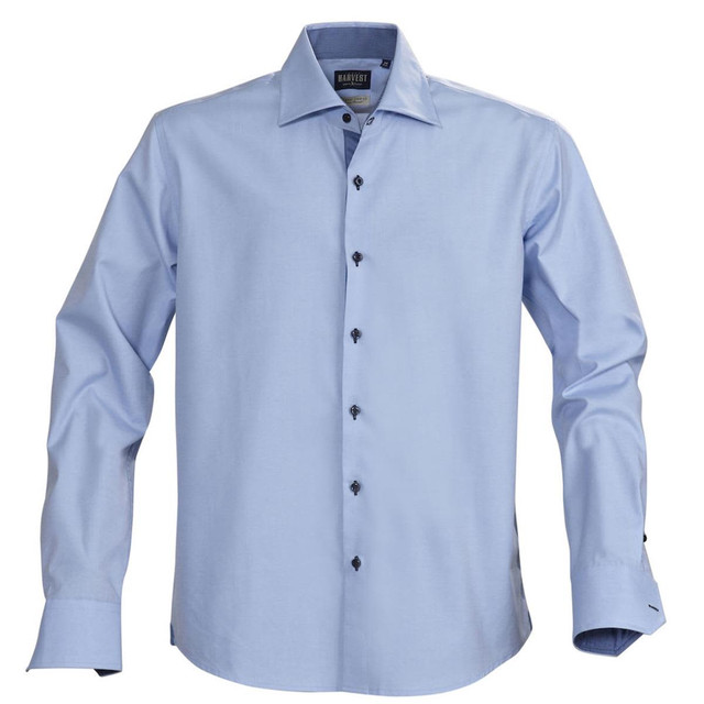 A light blue button-up shirt featuring long sleeves and a branded logo. Buttons are dark in colour.