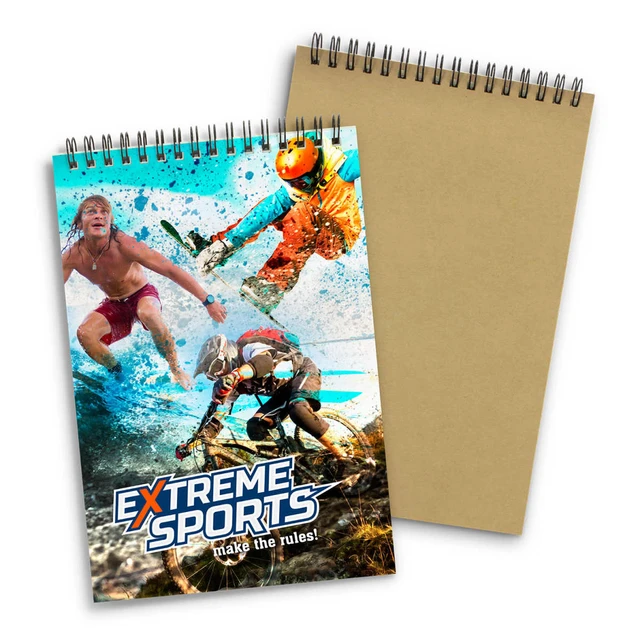 A medium note pad featuring an extreme sports design with images of athletes, showcasing vibrant colours and a spiral binding.