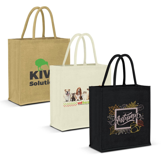 A collection of Lanza jute tote bags in natural, cream, and black, each featuring distinct logos and designs.