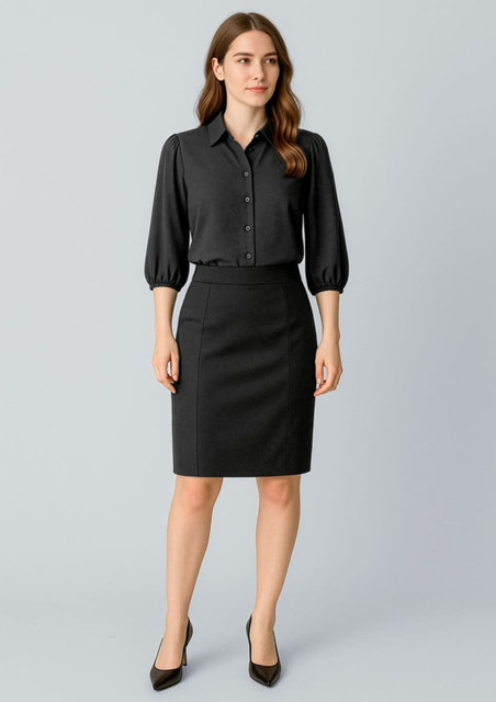 A black mid-waist pencil skirt paired with a black button-up blouse, featuring puffed sleeves.
