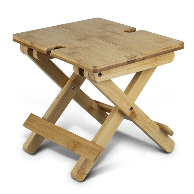 A folded bamboo wine table featuring a natural finish and crossed legs, designed for outdoor leisure activities.
