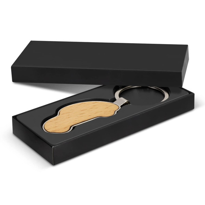 A wooden car-shaped key ring in a black gift box, featuring a metal key ring attachment.