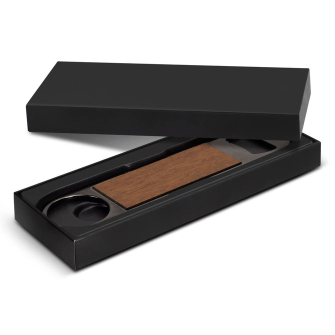 A drink bottle opener with a wooden handle, presented in a sleek black box. The box is partially open.