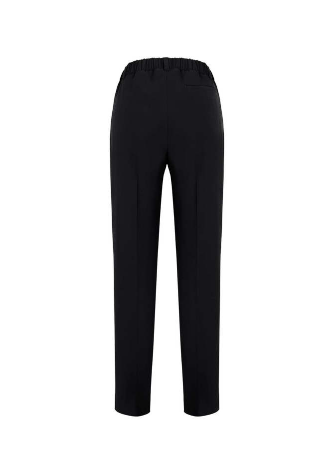 A pair of women's black bandless pants with an elastic waist and a sleek design from the back view.