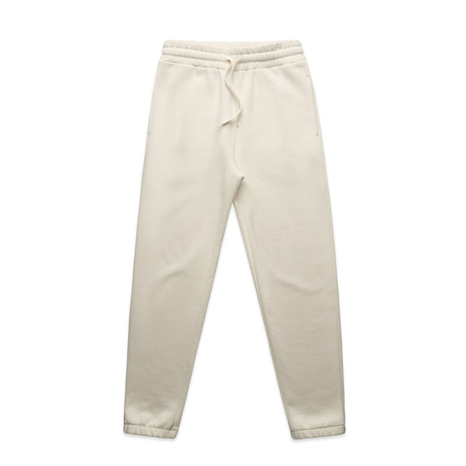 Track pants in a light cream colour with an elastic waistband and side pockets. Features a logo on the waistband.