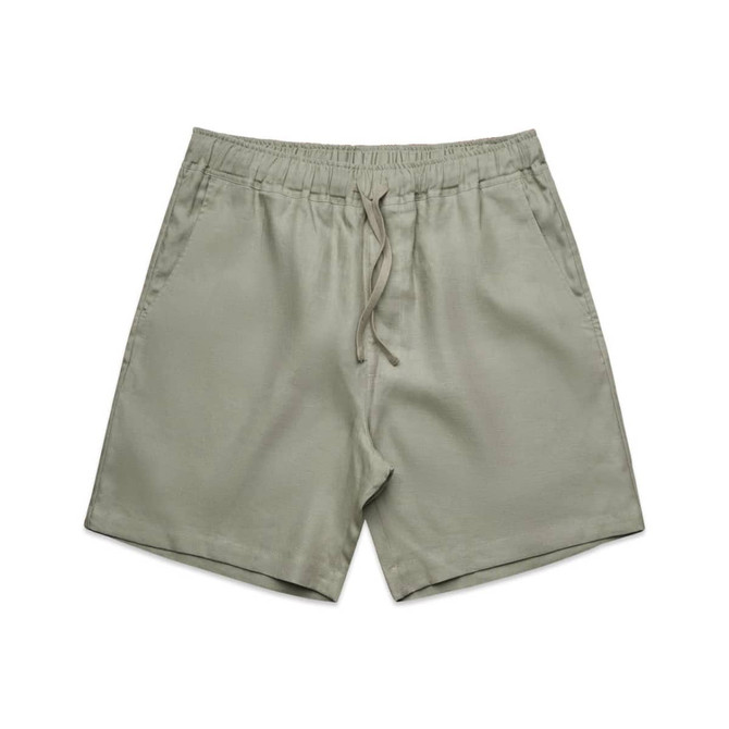 Linen dress shorts in a muted green shade, featuring an elastic waistband and drawstring.
