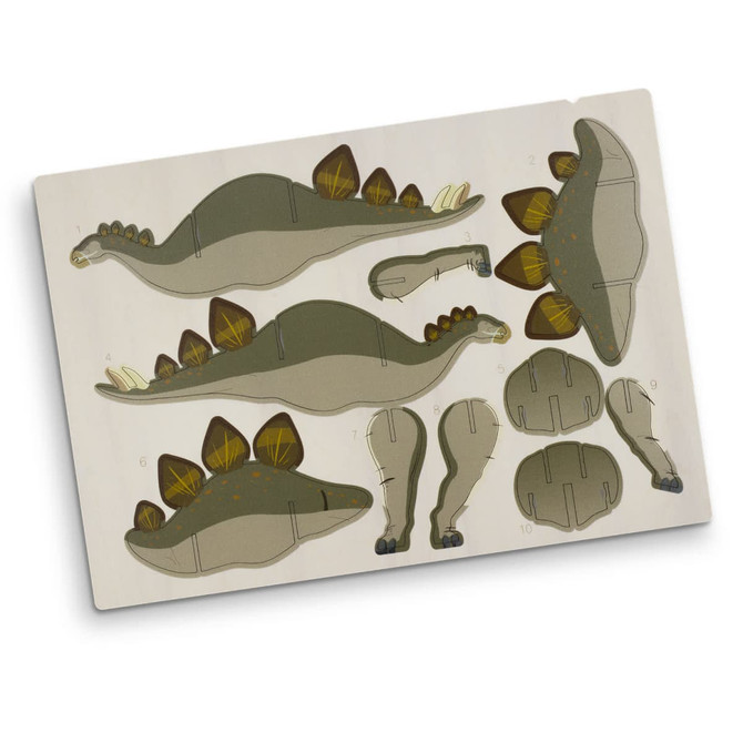 A wooden model kit featuring a green Stegosaurus shape with brown accents, including its iconic plates and tail.