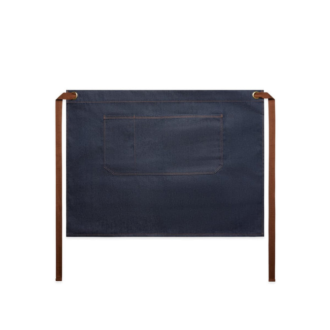 Denim half apron in dark blue with a large pocket and brown ties, featuring a logo.