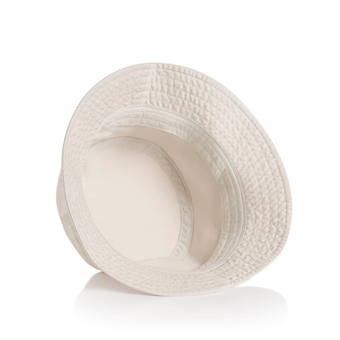 A cream-coloured faded bucket hat with a textured design and a wide brim, featuring a logo inside.
