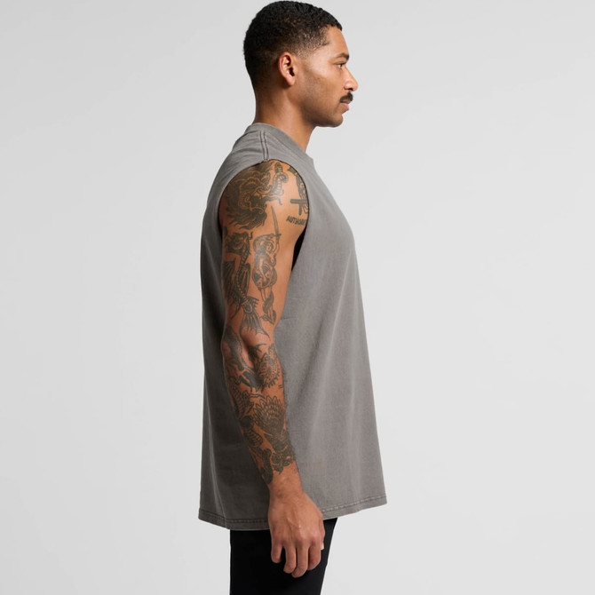 A grey sleeveless tank top displayed from the side, featuring a logo and showcasing tattooed arms.