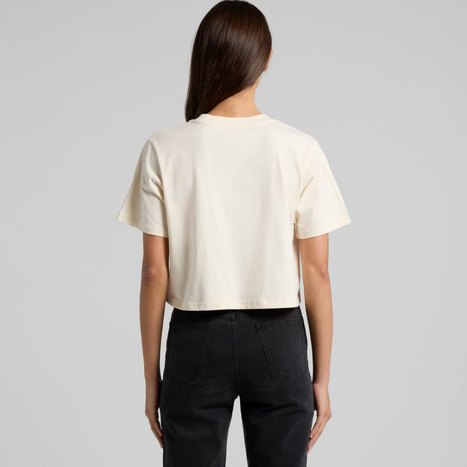 A cream crop t-shirt viewed from the back, featuring short sleeves and a simple design. It has a logo on the back.