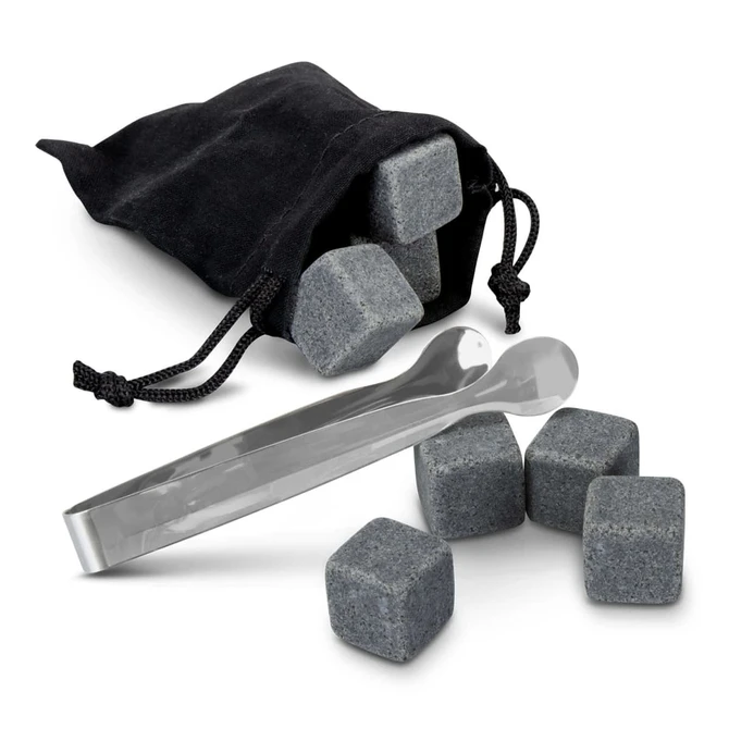 A black pouch containing grey whiskey stones and stainless steel tongs, arranged on a white background.