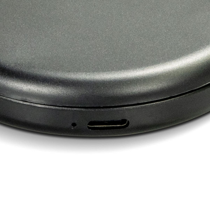 A compact mirror in a sleek black finish with a USB-C charging port on the side.