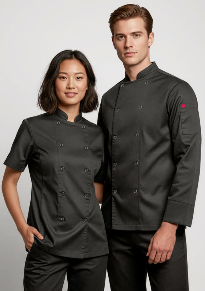 A short sleeve chef jacket in black, worn by a model and a model, featuring a logo on the sleeve.