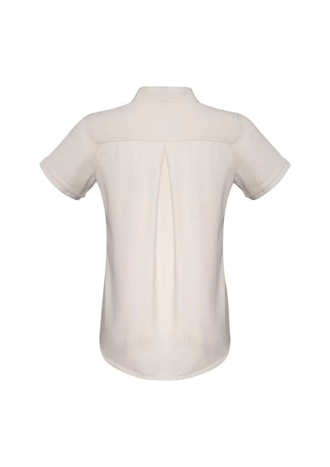 A short sleeve button-up shirt in a cream colour with a back pleat and a logo.