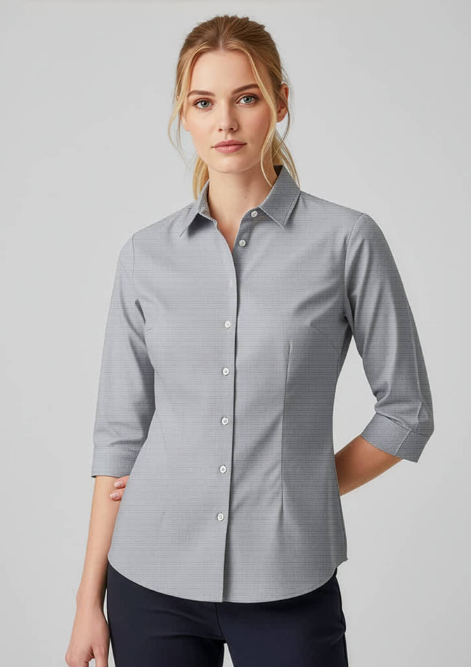A women’s 3/4 sleeve button-up shirt in light grey with a fitted design and a collar, featuring a logo.