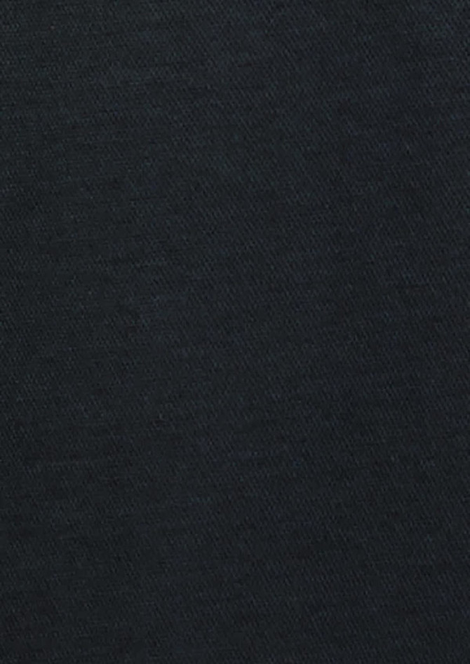 A long sleeve shirt in black, featuring a simple button-up design and a logo.