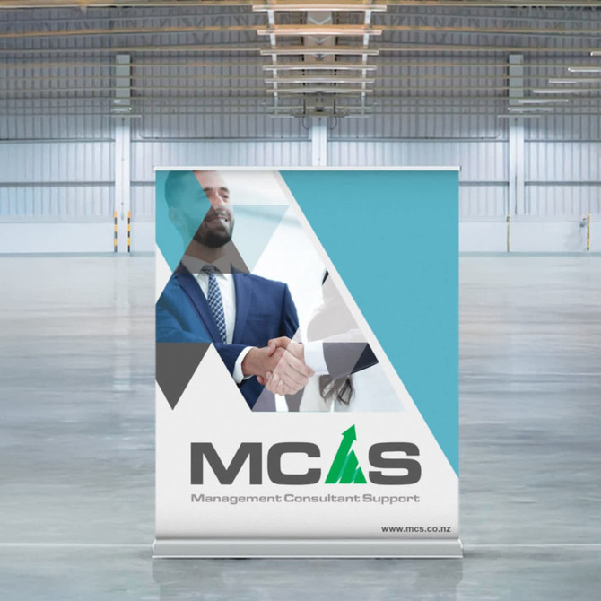 A wide luxury pull-up banner featuring a light blue and white design, with a logo and images of two people shaking hands.