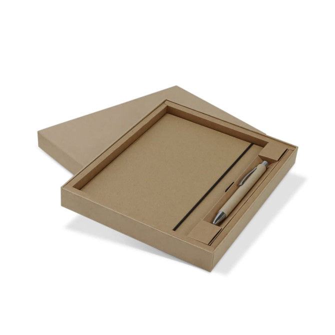 A kraft notebook and pen gift set in a cardboard box. The pen is beige and the notebook has a simple, natural finish.