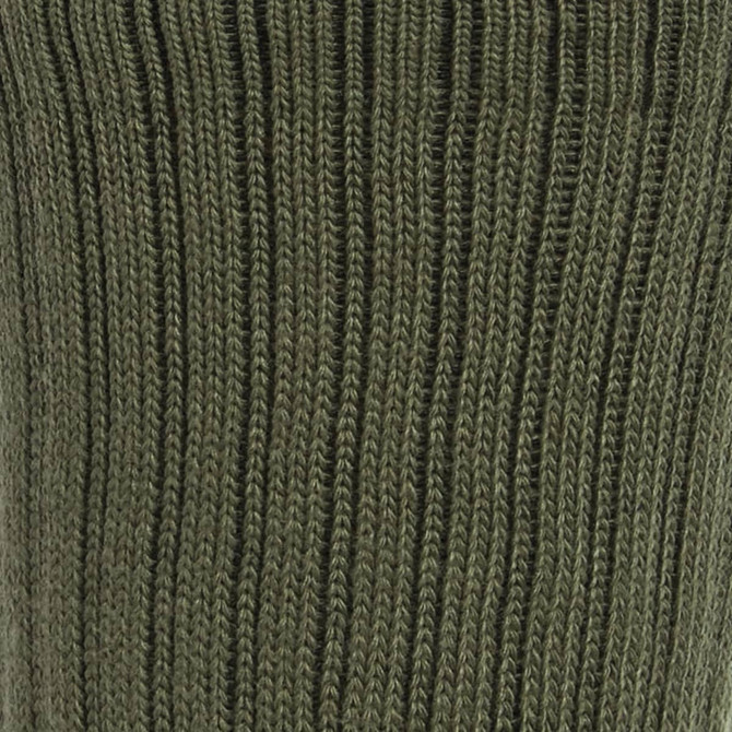 A close-up of a green knitted sock featuring a ribbed texture. The sock is part of a three-pack.