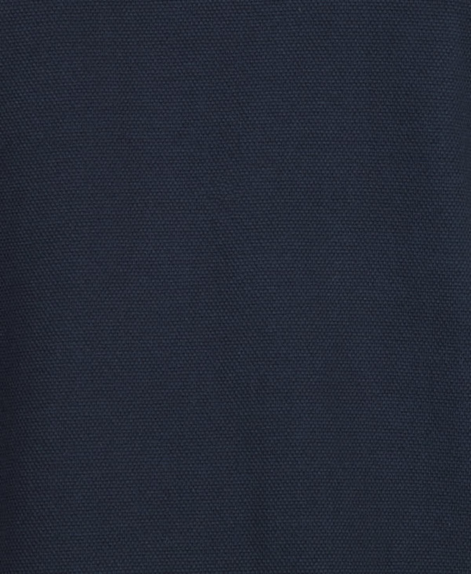 A navy blue cotton fabric texture, featuring a smooth and sturdy weave. The image highlights the material's quality.