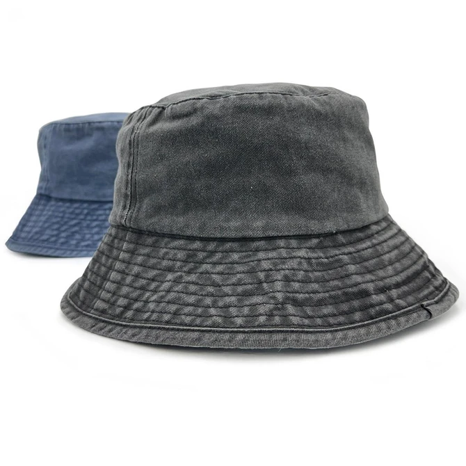 Two washed chino bucket hats in grey and navy, featuring a textured brim and a small logo on one.