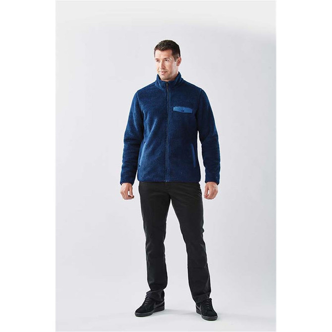 A men's Bergen Sherpa fleece jacket in navy blue, featuring a zip front and a chest pocket.