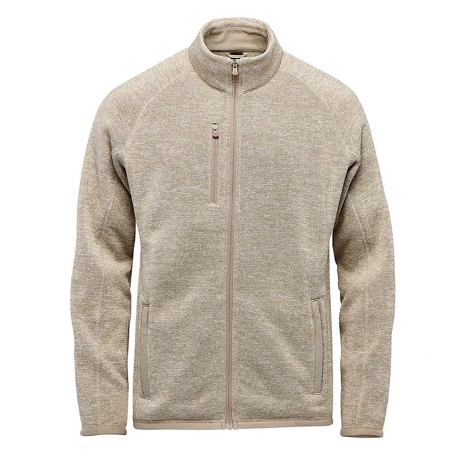 Men's Avalante Full Zip Fleece Jacket in beige with a zippered chest pocket and a fitted collar. Features a logo.